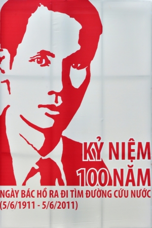 Ho Chi Minh City, Vietnam - June 08, 2011: A poster in the streets of Ho Chi Minh City celebrating the 100 years anniversary of when Ho Chi Minh (Uncle Ho) as a young man first travelled overseas to Europe in 1911 seeking freedom for his Vietnamese peopleのeditorial素材