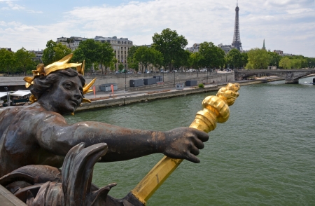Paris, France - July 25, 2013  Water Nymph on the Pont Alexandre III Bridge Paris France  In the background is the Eiffel Tower and Seine River のeditorial素材