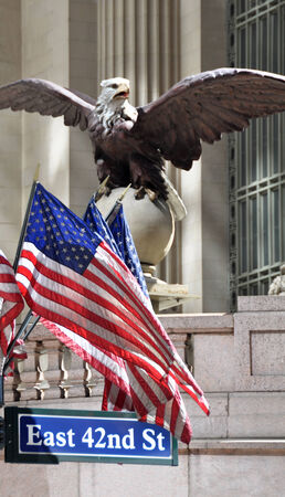 New York, USA - April 07, 2008  Eagle   Flags on Grand Central Terminal building, East 42nd Street のeditorial素材