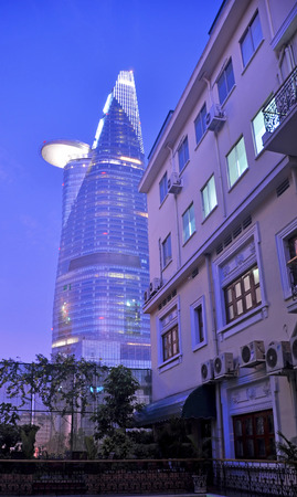 Ho Chi MInh City, Vietnam - June 04, 2011  Old   New - 262 5 metre tall  Bitexco Financial Tower...