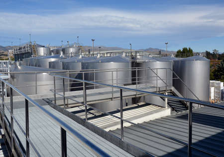 A farm of Grape & Wine storage and fermentation tanks at a Marlborough Vineyard, New Zealand.