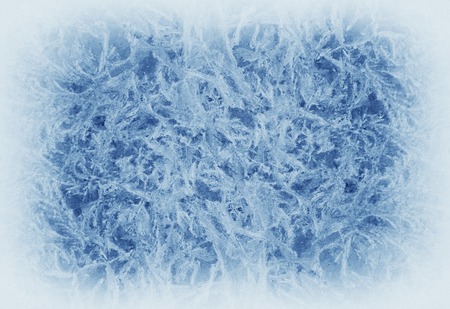 Icy pattern on frozen window. Frozen water texture.の写真素材