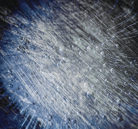Icy pattern on frozen window. Frozen water texture.