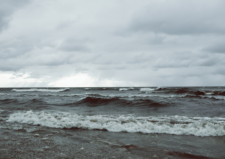 Sea water with small waves in Jurmala, Latvia. Coast of Baltic sea.の写真素材