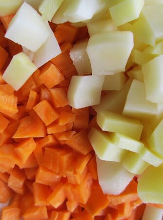 Close up of carrot and potatoes. Colorful raw vegetables.の写真素材