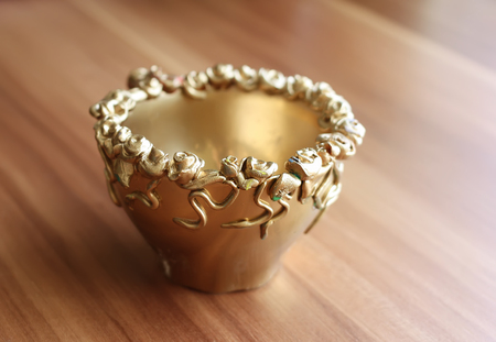 A cup with handmade decorationの写真素材