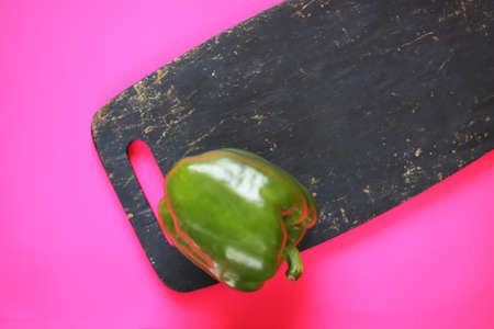 Green paprika on bright background.の写真素材