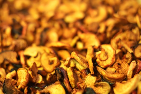 Slices of dried organic apples close up.の写真素材