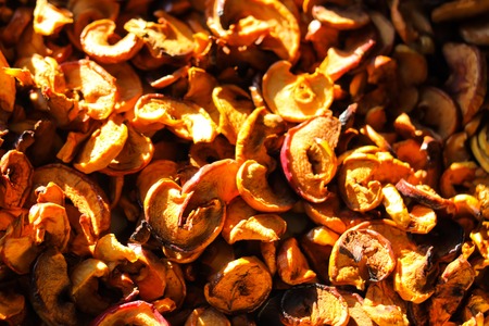Slices of dried organic apples close up.の写真素材