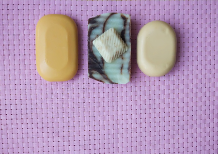 Handmade natural soap on pink background