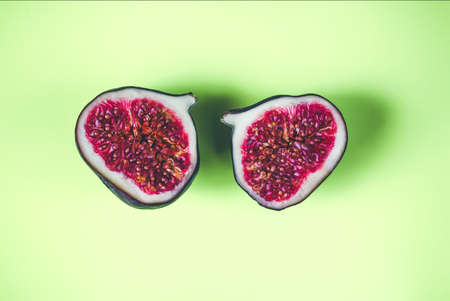 Fresh figs sliced fruits on light background.の写真素材