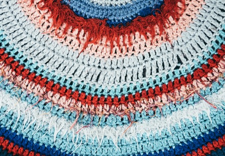 Colorful knitted mat surface with stripes.の写真素材