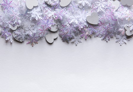 White artificial snowflakes on soft lightの写真素材