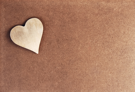 Valentines Day festive craft background with decorative heartの写真素材