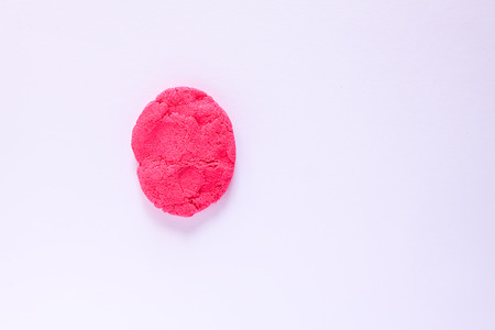 Kinetic sand on white background. Soft colorful surface for kids activities and fun.の写真素材