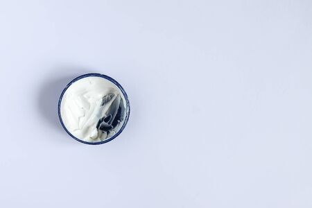 Cosmetic cream white texture in plastic containerの写真素材
