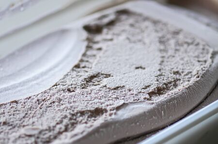 Melting chocolate ice cream surface close upの写真素材