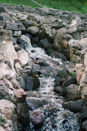 Flowing water on Bastion hill in Riga, Latvia, East Europe.の写真素材