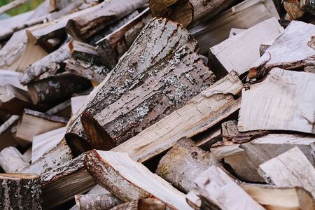Pile of firewood prepared for the winterの写真素材