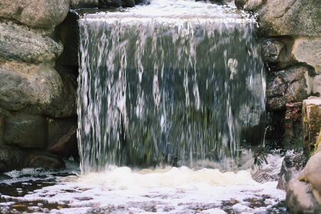 Flowing water on Bastion hill in Riga, Latvia, East Europe.の写真素材