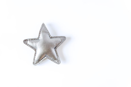 Grey toy star on white background. Decorative elementの写真素材