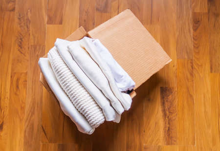 Folded colorful clothes. Home organizing. Domestic storage.の写真素材