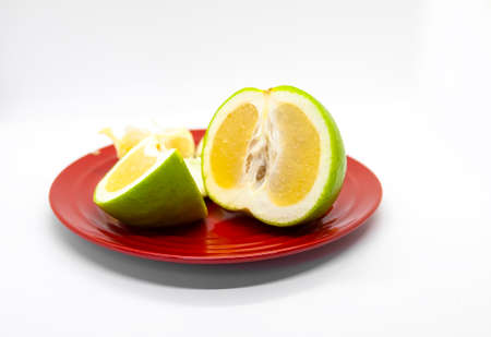 Fresh green grapefruits. Sliced fruit