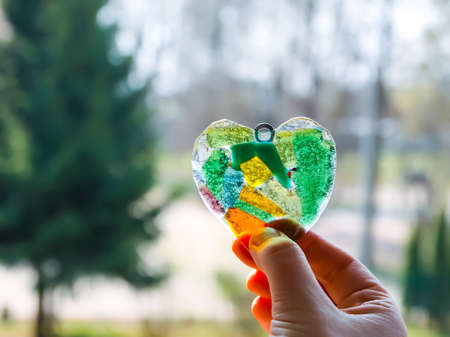 Heart shape handmade colorful glassの写真素材