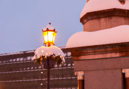 Illuminated street in the city. Christmas decorations in the old town Riga, Latvia.の写真素材
