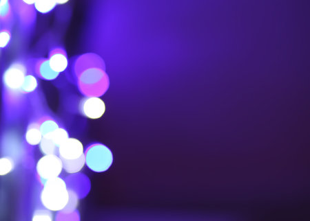 Abstract bokeh background. Blurred garland lights.