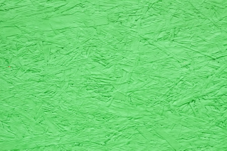 Green wood board rough texture. Painted plywood.