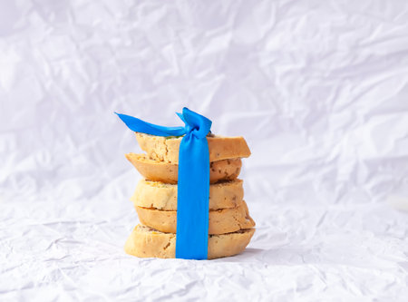 Homemade biscotti or cantuccini. Sweet gluten-free dessert tied with a satin ribbon bow