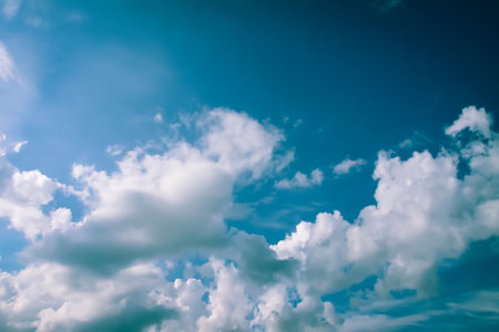 Blue sky with clouds background.の写真素材