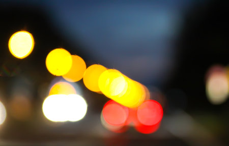 Blurred colorful bokeh traffic lights. Night scene.