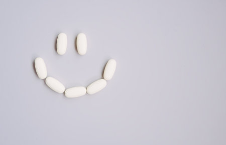 Pills on light background. Medicine theme.の写真素材