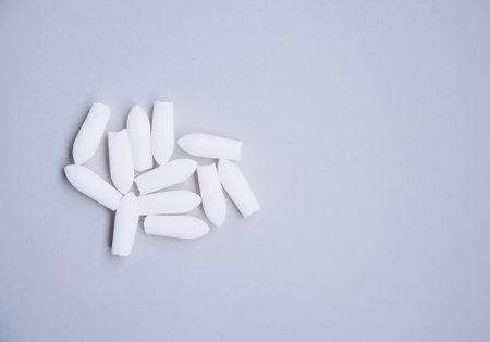 Pills on light background. Medicine theme.