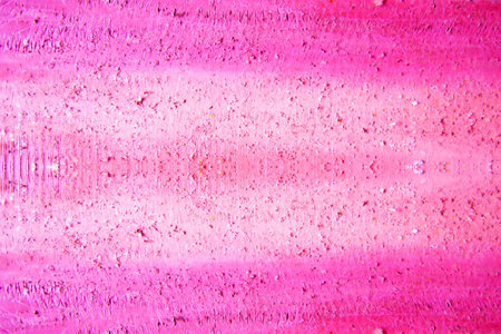 Makeup pigments blended on paper forming artistic strokes. A creative mix of color and texture.