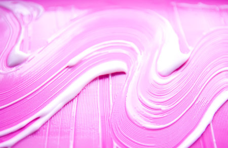 Cosmetic cream smear captured in soft daylight. Minimal and fresh visual of beauty product.の写真素材