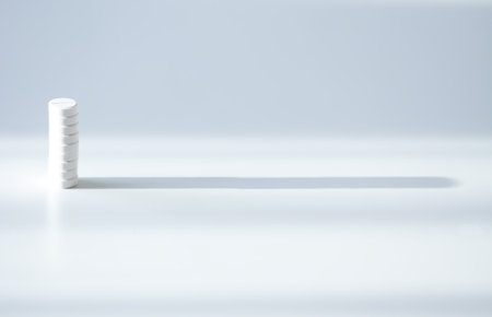 Stack of white pills. Clarity, vitality, and self-care.の写真素材