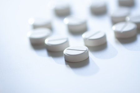 Vitamins and supplements on light backdrop. Conveys purity, health, and energy.の写真素材