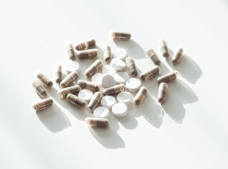 Pills arranged neatly. Reflects daily health habits and modern medicine.の写真素材