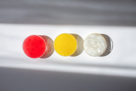 Shiny slime mass on neutral background. Suggests creativity and tactile satisfaction.の写真素材