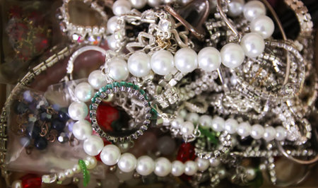 An opened jewelry box reveals a sparkling necklace. The image expresses beauty, excitement, and meaningful moments.の写真素材