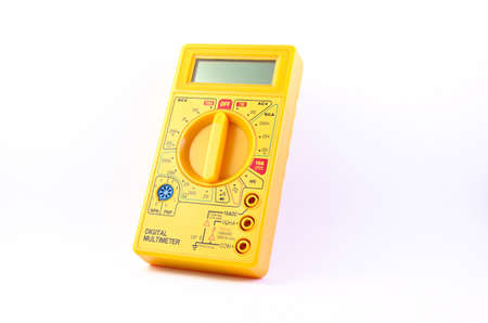 Yellow digital multimeter white backgroundの写真素材