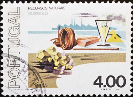 PORTUGAL - CIRCA 1977: A stamp printed in Portugal,shows a representation of various natural resources,circa 1977.のeditorial素材