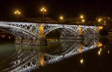 Seville Triana Bridge close up at night,Spain のeditorial素材