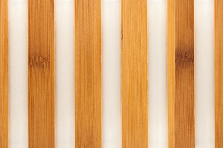 Texture of wooden strips embedded in the plastic.の写真素材