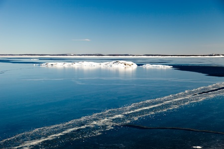 Blocks of ice on the coast of the frozen sea.