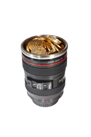 A moneybox in the shape of a lens on white background.の写真素材