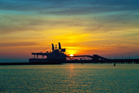 Coal pier at sunrise in port of Gdansk, Poland.